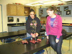 Students working in physics lab