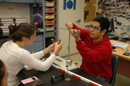 Students setting up a physics lab